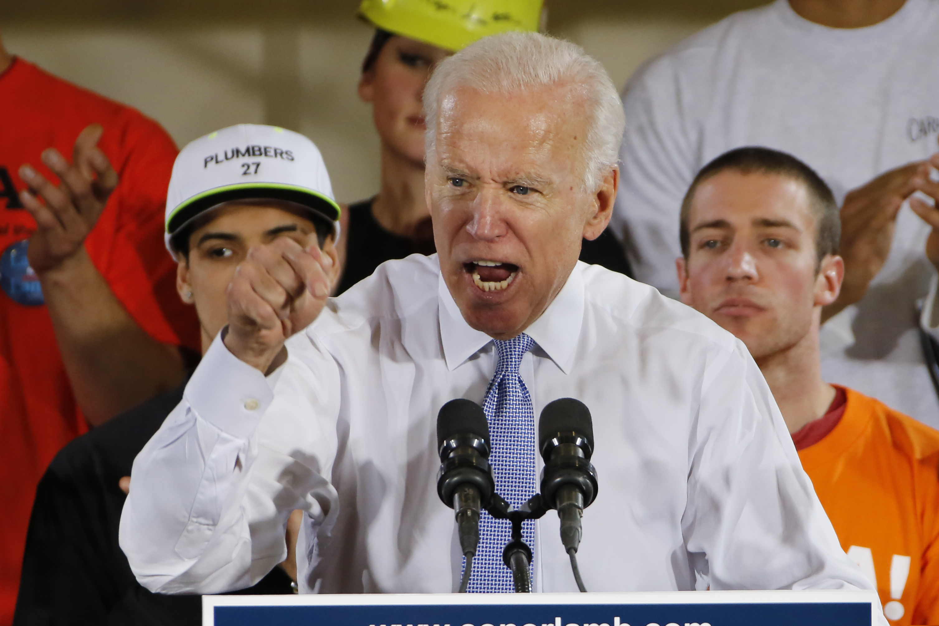 FILE- In this March 6, 2018 file photo, former Vice President Joe Biden speaks at a rally in Collier, Pa. Biden is picking Pennsylvania for the site of his first stump speech of the presidential campaign, sending a clear signal that he intends to own what may be the race’s hardest-fought battleground of 2020. (AP Photo/Gene J. Puskar, File)
