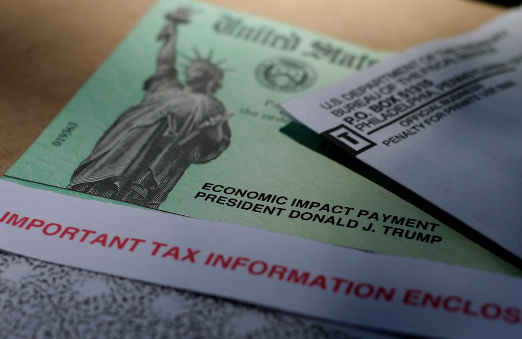 (Eric Gay | AP) President Donald J. Trump's name is printed on a stimulus check issued by the IRS in April. Utah, with its relatively strong economy, is last in the nation for the amount of federal COVID-19 funding that has flowed into the state so far, a recent per-capita analysis shows.