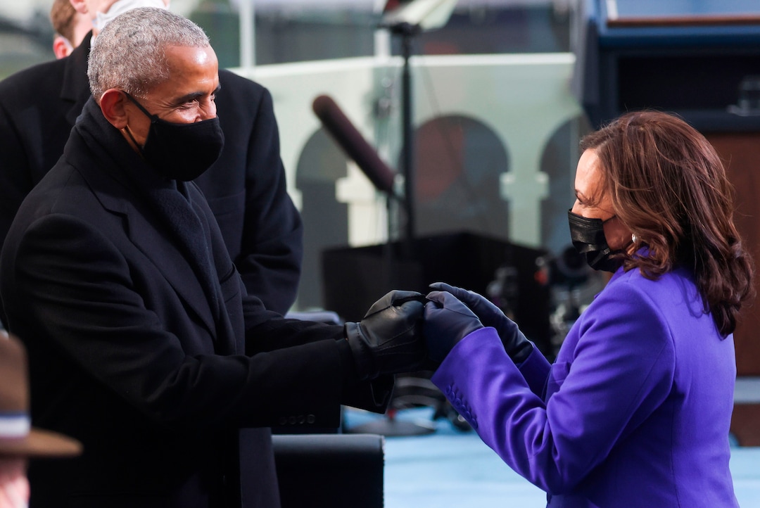 Former President Barack Obama and Vice President Kamala Harris fist-bump at the Capitol in Washington on Wednesday, Jan. 20, 2021. (Jonathan Ernst/Pool via The New York Times) -- FOR EDITORIAL USE ONLY. --