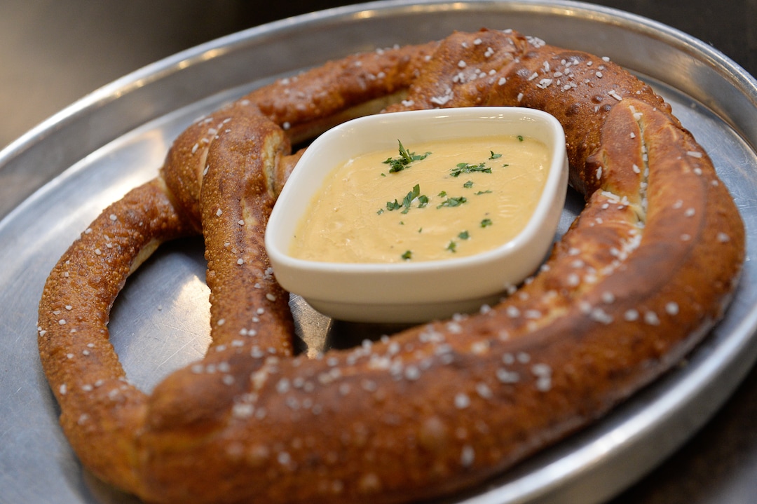 (Francisco Kjolseth  |  The Salt Lake Tribune)  The pretzel with beer cheese at the new Pins & Ales 21+ bar which is adjacent to the all ages All Star Bowling which opened a new 70,000 square foot, high-tech bowling and entertainment center at Valley Fair Mall, in West Valley City. It has 32 lanes with luxury seating, laser tag and virtual reality games as well as old-school air hockey, basketball and bumper cars.