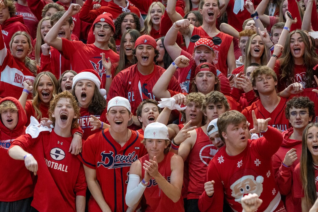 (Rick Egan | The Salt Lake Tribune) The Springville Red Devils celebrate their 54-43 win over Lehi, in the Girls 5A State Championship game, at the Marriott Center in Provo, on Saturday, March 5, 2022. 