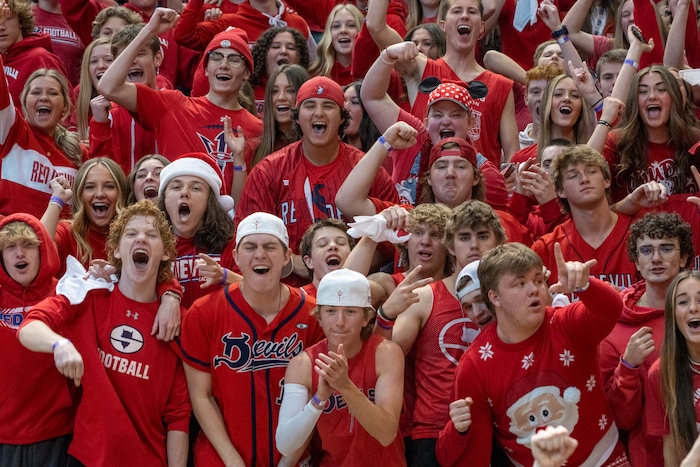 (Rick Egan | The Salt Lake Tribune) The Springville Red Devils celebrate their 54-43 win over Lehi, in the Girls 5A State Championship game, at the Marriott Center in Provo, on Saturday, March 5, 2022. 
