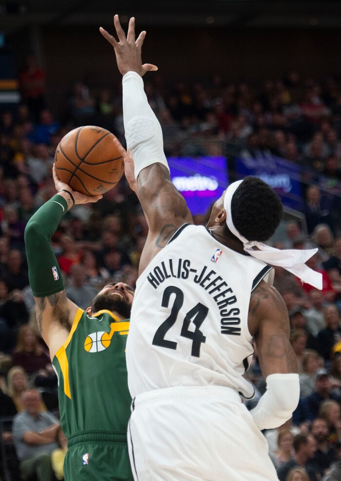 (Rick Egan  |  The Salt Lake Tribune)  Utah Jazz guard Ricky Rubio (3) tries to get a shot off, as Brooklyn forward Rondae Hollis-Jefferson (24) defends for the Nets, in NBA action between Utah Jazz and Brooklyn Nets, at  Vivint Smart Home Arena, Saturday, March 17, 2019.



