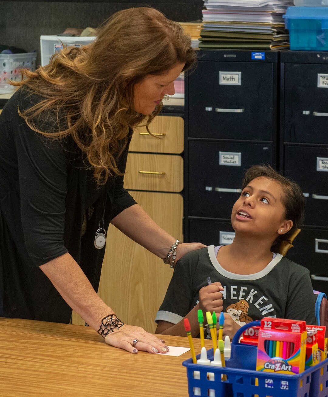 (Rick Egan  |  The Salt Lake Tribune)         Jeri Rigby, the new principal of Copperview Elementary School, visits with Aleah Rodriguez, on the first day of school, Monday, Aug. 19, 2019.