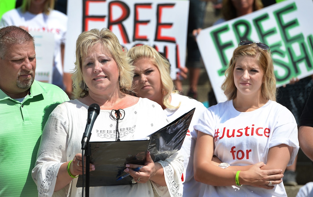 Scott Sommerdorf   |  The Salt Lake Tribune  
In this July 30, 2016, photo, Laurie Holt, Josh Holt's mother, speaks at a rally on the east steps of the Utah State Capitol calling for the release of her then-24-year-old son Josh Holt, who was then jailed in Venezuela. At left is her husband Jason Holt, with Josh's sisters Katie, and Jenna Holt, far right. Laurie Holt died Feb. 10, 2019, at age 50.