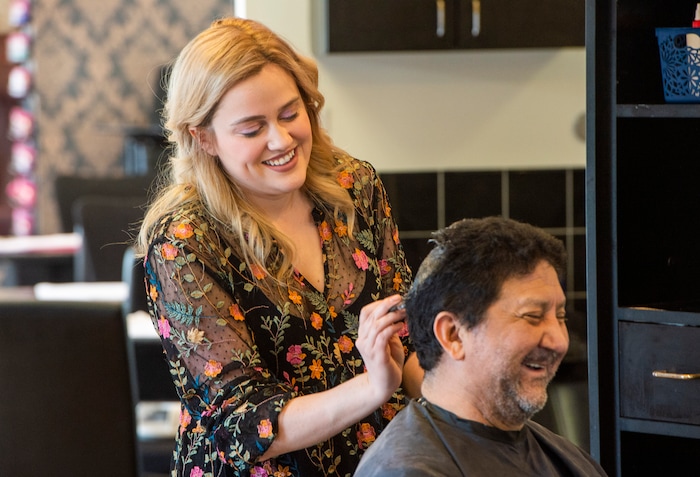 (Rick Egan  |  The Salt Lake Tribune)     Alyssa Brown works on at Mid City Salon, taking precautions to protect employees and customers during the coronavirus, Saturday, March 21, 2020.