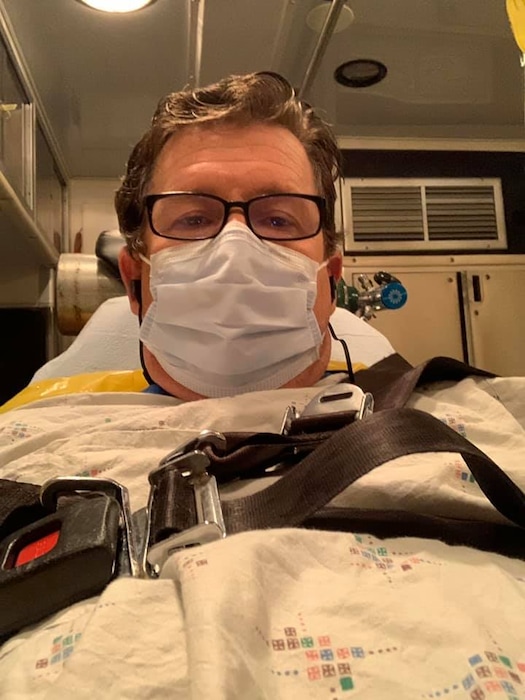 (Photo courtesy of Mark Jorgensen) Mark Jorgensen, the first Utahn to be treated for COVID-19, takes a ride in an ambulance. He spoke Sunday about his experience with the coronavirus on the one year anniversary of his arrival to Intermountain Medical Center.