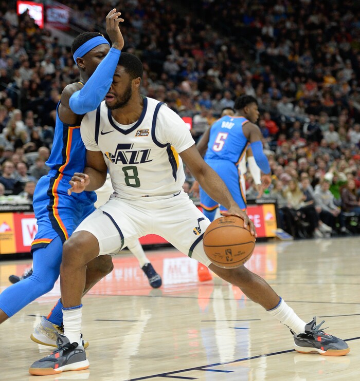 (Francisco Kjolseth  |  The Salt Lake Tribune)  Oklahoma City Thunder guard Dennis Schroder (17) pressures Utah Jazz guard Emmanuel Mudiay (8) as the Utah Jazz host the Oklahoma City Thunder in their NBA basketball game at Vivint Smart Home Arena in Salt Lake City on Mon. Dec. 9, 2019.