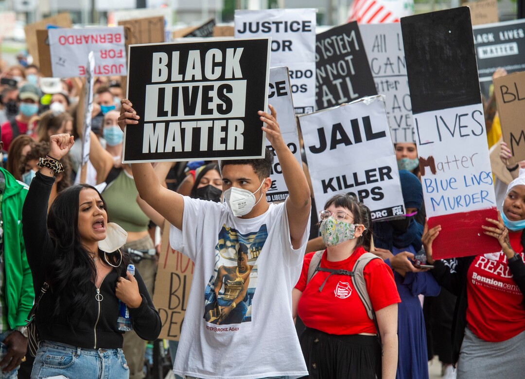 (Rick Egan  |  The Salt Lake Tribune) Demonstrators march down State Street in Salt Lake City on Saturday, June 13, 2020.