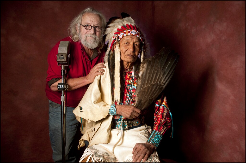 (Raechel Running | The Associated Press) This 2012 photo provided by Raechel Running shows her father, photographer John Running, left, with Jones Benally at their family photo studio in Flagstaff, Ariz. Running died Sunday, Jan. 7, 2018, of complications from a brain tumor, said his daughter Raechel. He was 77.
