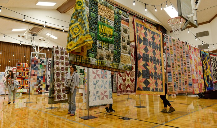(Francisco Kjolseth  |  The Salt Lake Tribune)  Nacele Hart has made more than 100 quilts and numerous sewing projects over a 10-year period for her children, grandchildren and great-grandchildren. On Friday at a church in Orem her family put them on display with plans to hand them out Saturday to her loved ones. She's also currently battling cancer.