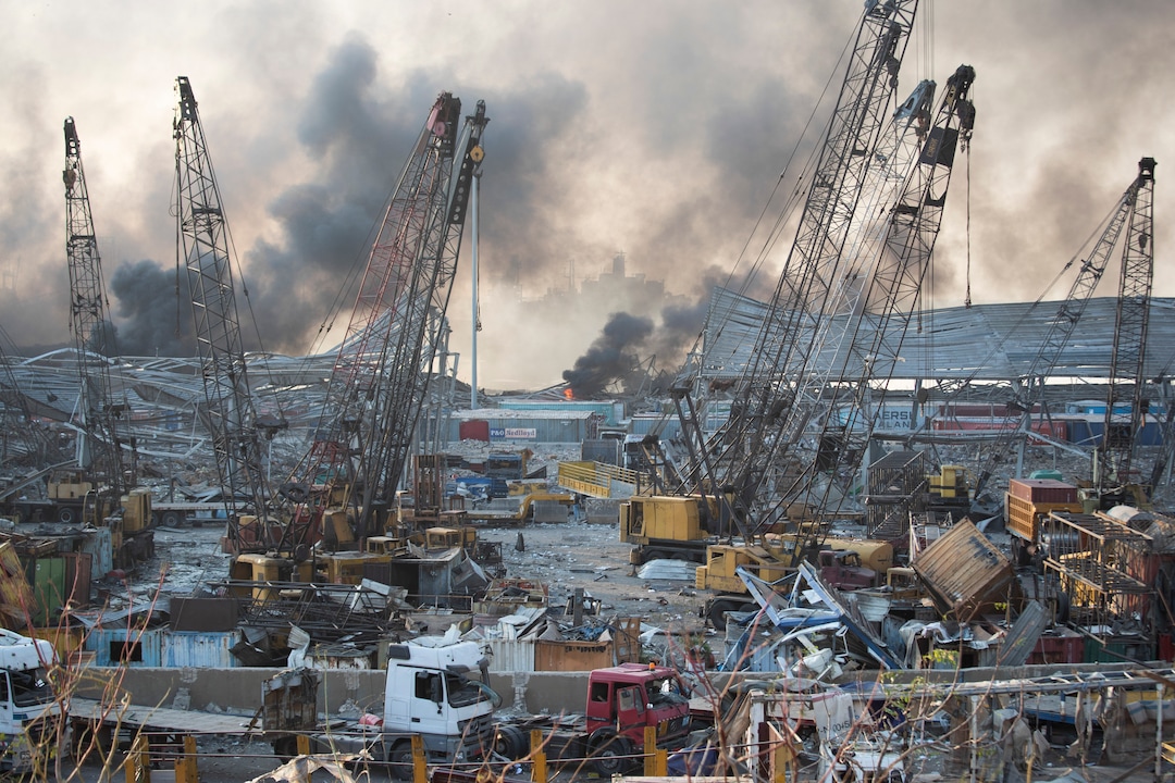 Aftermath of a massive explosion is seen in in Beirut, Lebanon, Tuesday, Aug. 4, 2020. Massive explosions rocked downtown Beirut on Tuesday, flattening much of the port, damaging buildings and blowing out windows and doors as a giant mushroom cloud rose above the capital. Witnesses saw many people injured by flying glass and debris. (AP Photo/Hassan Ammar)