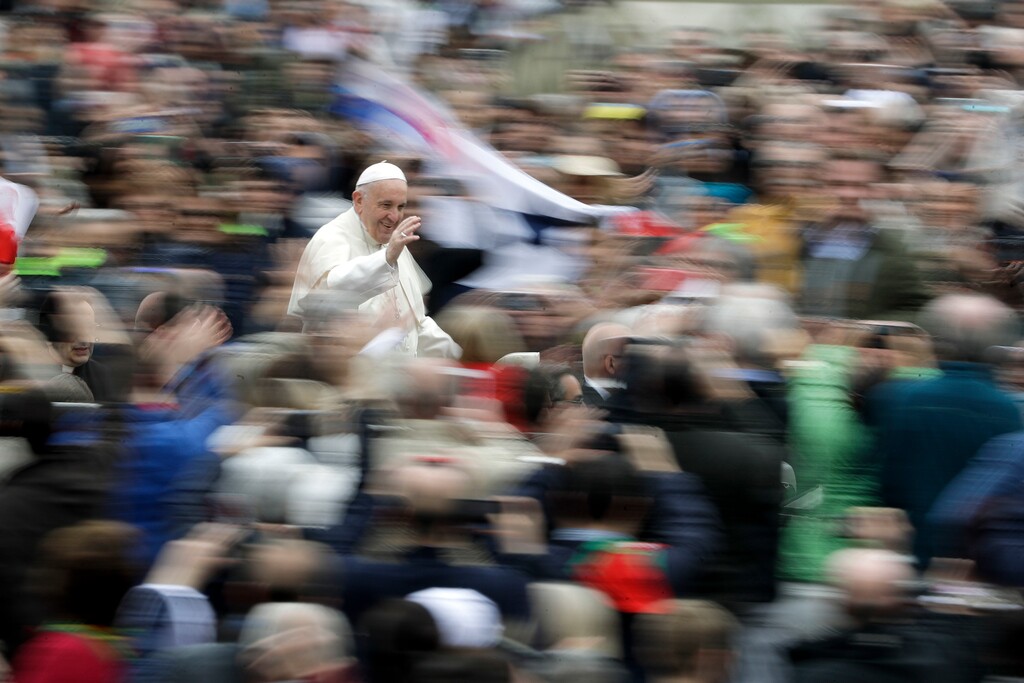 (AP Photo/Andrew Medichini) Pope Francis arrives in St.Peter's Square for his weekly general audience, at the Vatican, Wednesday, April 11, 2018.