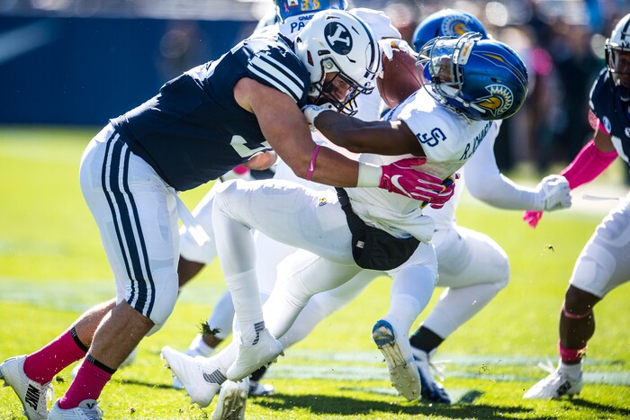 (Chris Detrick  |  The Salt Lake Tribune)  Brigham Young Cougars running back Brayden El-Bakri (35) tackles San Jose State Spartans wide receiver Rahshead Johnson (8) on the opening kick-off during the game at LaVell Edwards Stadium Saturday, October 28, 2017.  
