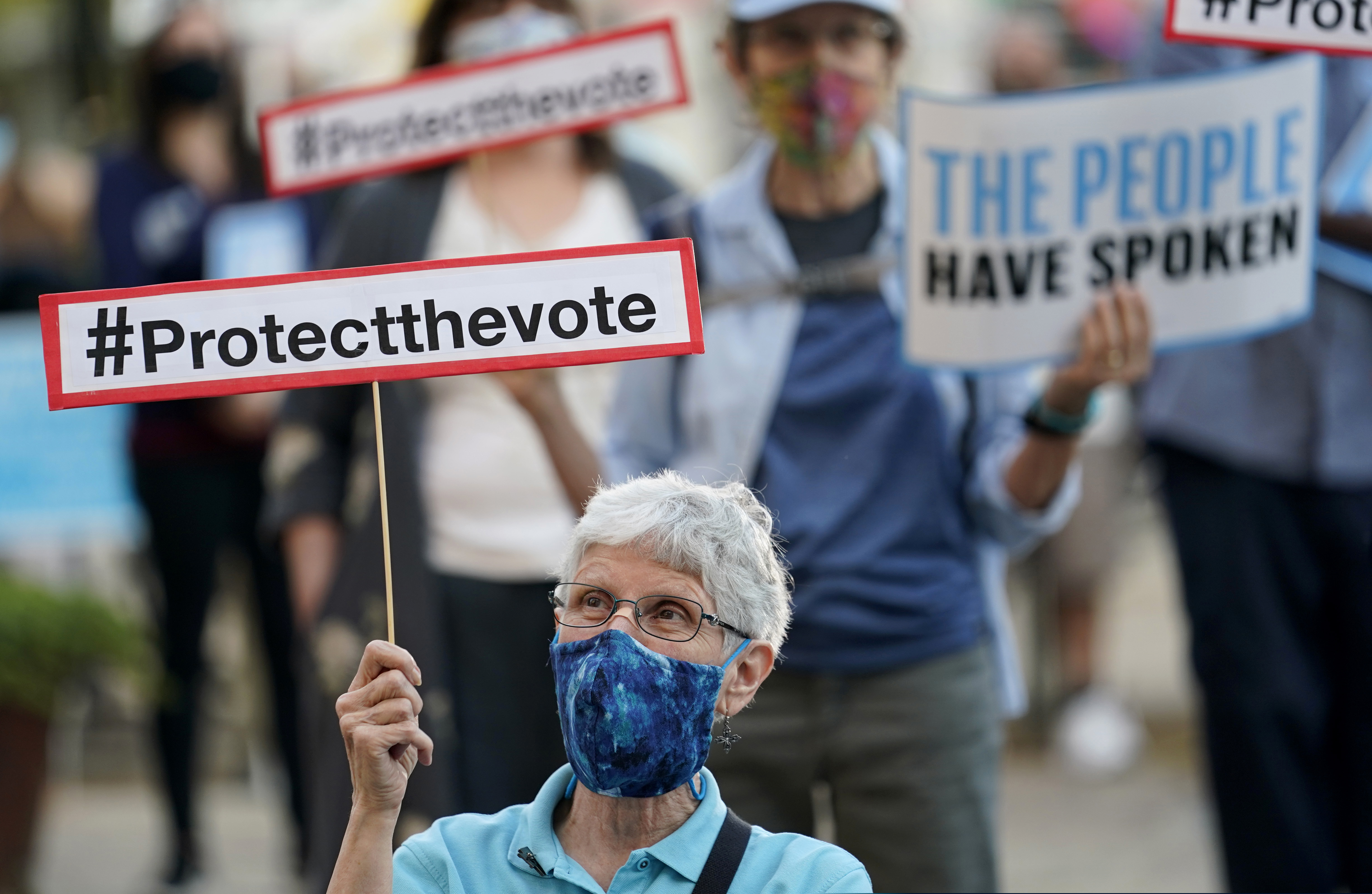 Protesters gather at a protect the vote rally in downtown San Antonio, Wednesday, Nov. 4, 2020. (AP Photo/Eric Gay)