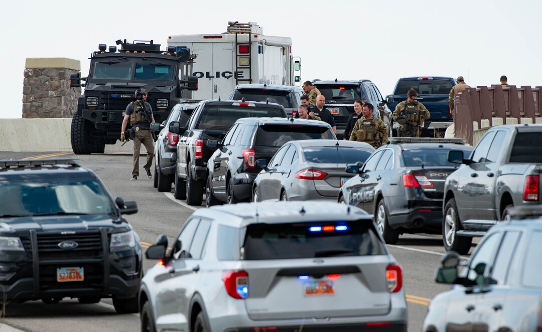 (Francisco Kjolseth  | The Salt Lake Tribune) Numerous police agencies respond to a man driving erratically and claiming to have a gun and a bomb as a police chase ends on Center Street over Legacy Highway on Wednesday, March 17, 2021.