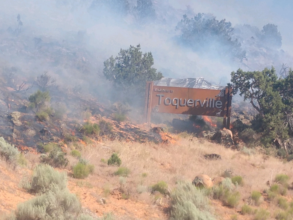 (Courtesy Utah Fire Info) A wildfire burns near Toquerville on May 18, 2020.