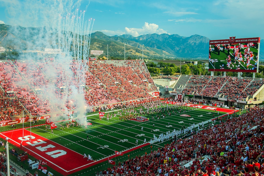 (Chris Detrick  |  The Salt Lake Tribune)  Utah Utes run onto the field before the game at Rice-Eccles Stadium Thursday, August 31, 2017. Utah Utes are leading North Dakota Fighting Hawks 17-9 at halftime. 