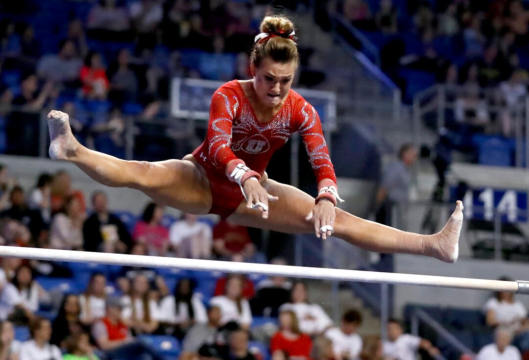 Utah's Tiffani Lewis competes on the uneven parallel bars during the NCAA women's gymnastics championships Friday, April 14, 2017, in St. Louis. (AP Photo/Jeff Roberson)