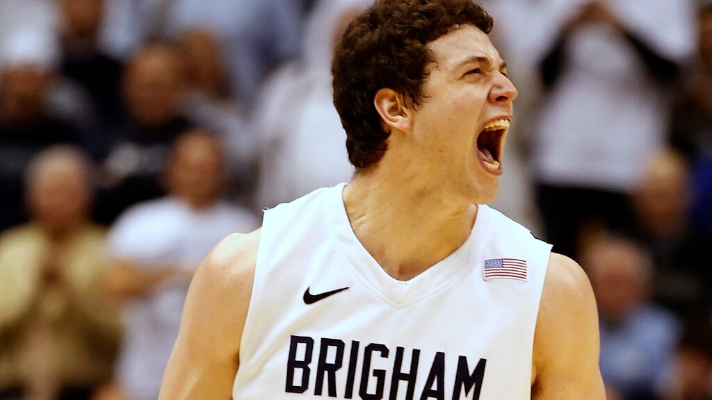 BYU's Jimmer Fredette yells toward the crowd after making a three pointer during a game against San Diego State's during the second half of an NCAA college basketball game in Provo, Utah, Wednesday, Jan. 26, 2011. BYU beat San Diego State 71-58. (AP Photo/George Frey)