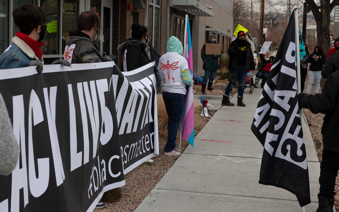 (Rick Egan | The Salt Lake Tribune) Lex Scott, the leader of Black Lives Matter Utah, joins a group of more than 100 homeless advocates to protest the way the health department has been forcing people experiencing homelessness to move in the middle of a pandemic and the coldest time of the year, in front of the Salt Lake Public Health Center on Friday, Dec. 18, 2020.