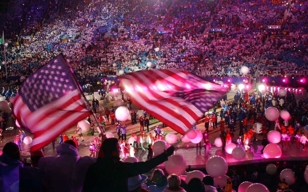 (Francisco Kjolseth  |  Tribune file photo) Thousands of fans and athletes celebrate the end of the 2002 Salt Lake Olympics at the dazzling Closing Ceremony at Rice-Eccles Stadium.