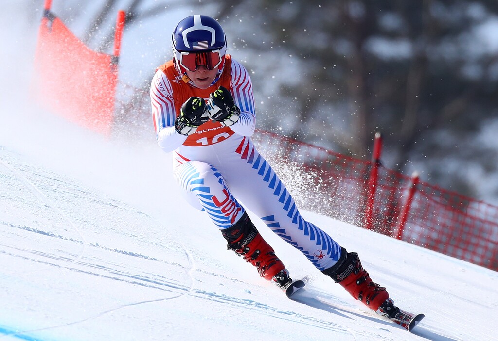 (Alessandro Trovati | AP file photo) United States' Breezy Johnson competes in women's downhill training at the 2018 Winter Olympics in Jeongseon, South Korea, Feb. 20, 2018. Johnson tore a ligament in her knee during a second straight offseason training session.