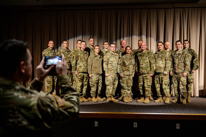 (Trent Nelson | The Salt Lake Tribune)
Eighteen Utah National Guard soldiers deploying to Fort Meade, Maryland, for 400 days to conduct cyber protection operations pose for a photograph at their departure ceremony in Draper on Wednesday Jan. 2, 2019.
