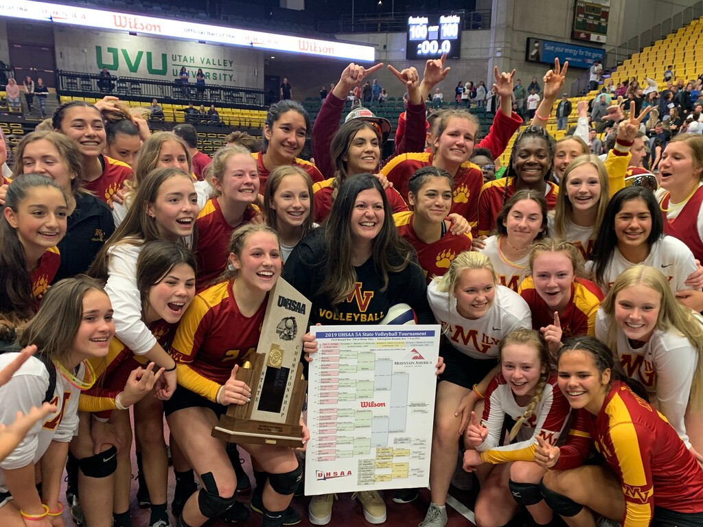 (Alex Vejar | The Salt Lake Tribune)
The Mountain View High girls volleyball team celebrates winning its first state championship since 1982 after beating Farmington High 3-1 Saturday, Nov. 9, 2019 at Utah Valley University in Orem, Utah.