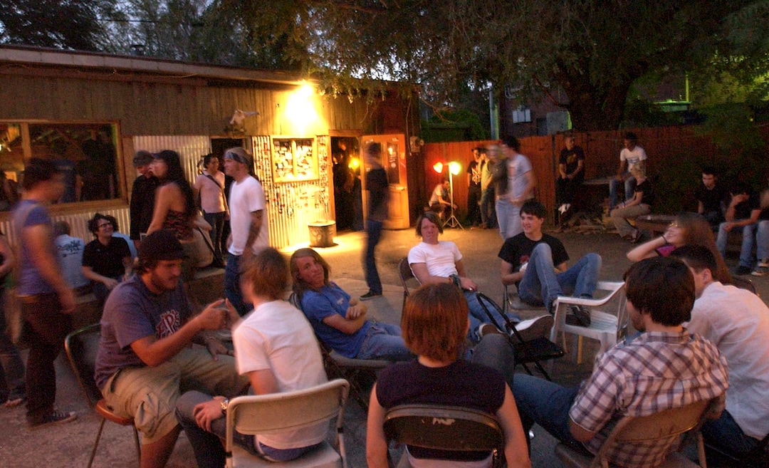 (Ryan Galbraith  |  Tribune file photo)  Kids hang out in the open air at Kilby Court in 2004. The venue turns 20 this year.
