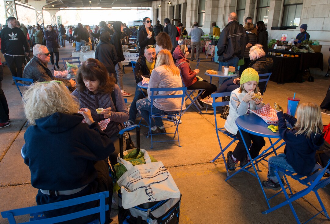(Rick Egan  |  The Salt Lake Tribune)      Shoppers enjoy their food at the Downtown Winter Market which opened today at the Rio Grande Depot, Saturday, Nov. 10, 2018.