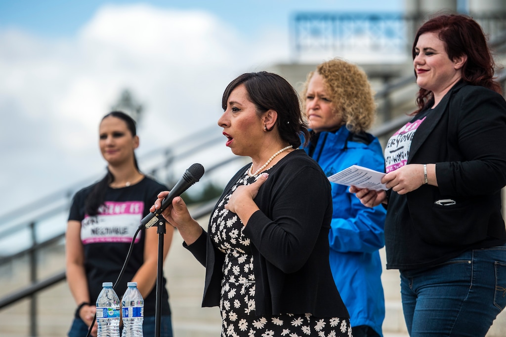 Chris Detrick | The Salt Lake Tribune
Representative Angela Romero (D-Salt Lake City) speaks outside the Utah State Capitol during the 5th annual SlutWalk Walk of No Shame Saturday September 24, 2016. The annual SlutWalk is a march against sexual assault, victim blaming, slut shaming, and rape culture- with millions of participants in thousands of cities around the globe. The Walk of No Shame aims to strike down the ideas that survivors of sexual assault or violence somehow deserved it, or that anyone is inviting this behavior. By dismantling this idea, and the culture that surrounds it, we hope to see better access to help for survivors, better reporting methods, and less stigma around reporting these crimes.