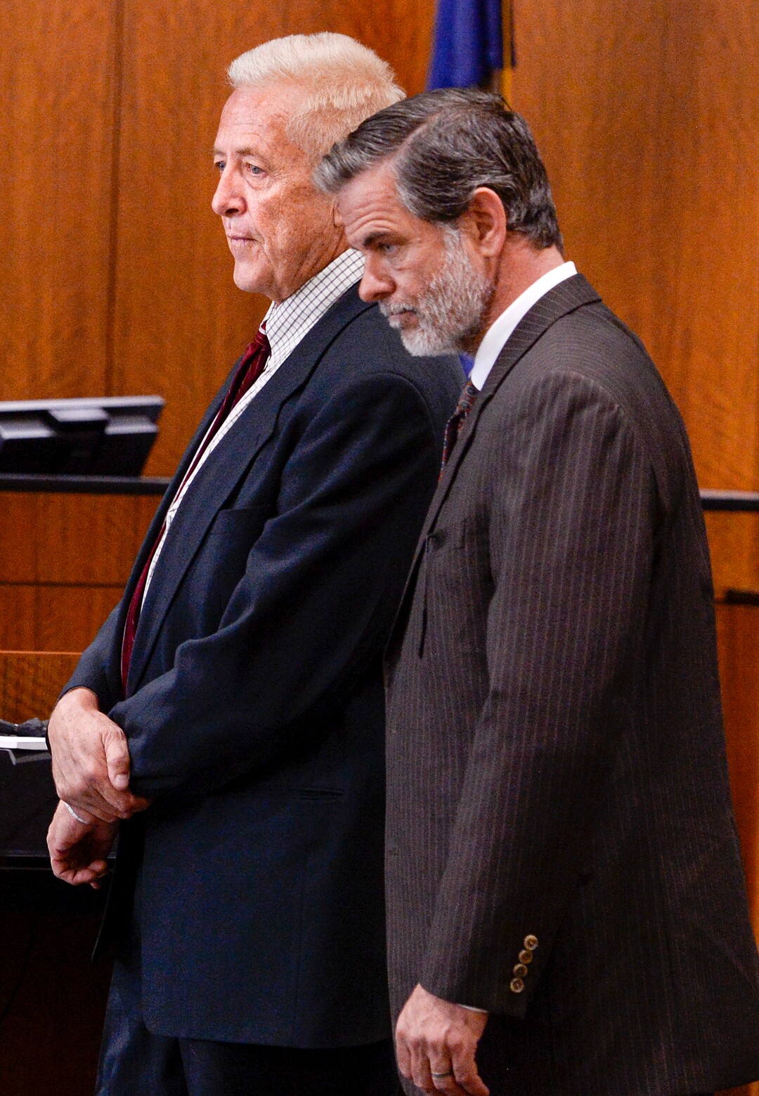 (Leah Hogsten  |  The Salt Lake Tribune)  Robert Lyman, left, flanked by his attorney, Andrew Deiss, was bound over for trial and pleaded not guilty to charges of reckless burning and burning during a closed fire season before Judge James Brady in Fourth District Court in Provo, Utah, July 30, 2019.