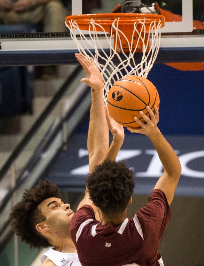 (Rick Egan  |  The Salt Lake Tribune)   Texas Southern Tigers guard Cainan McClelland (20) takes a shot, as Brigham Young Cougars guard Elijah Bryant (3) defends, in basketball action, Brigham Young Cougars vs Texas Southern Tigers, at the Marriott Center in Provo, Saturday, December 23, 2017.