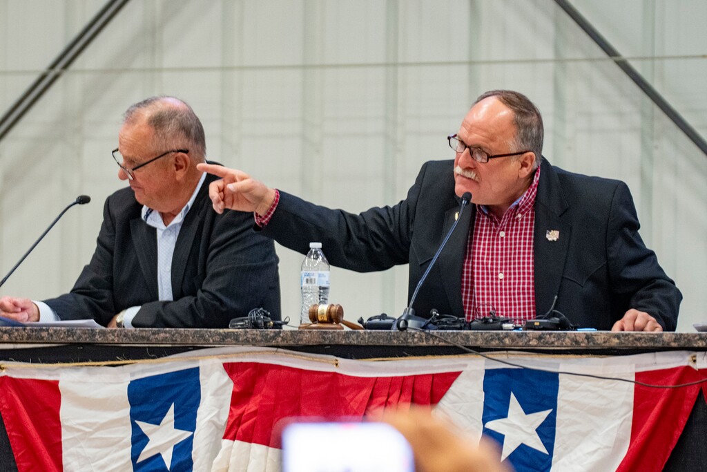 (Rick Egan | The Salt Lake Tribune) Box Elder County Commissioner Tyler Vincent, right, warns the crowd during a commission meeting at the county fairgrounds in Tremonton on Tuesday, May 4, 2026.