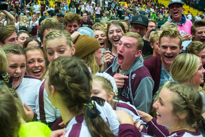 (Chris Detrick  |  The Salt Lake Tribune)  Morgan students rush the court as the Morgan Trojans celebrate winning the 3A volleyball state championships at the UCCU Center at Utah Valley University Thursday, October 26, 2017.  Morgan defeated North Sanpete 3-0.