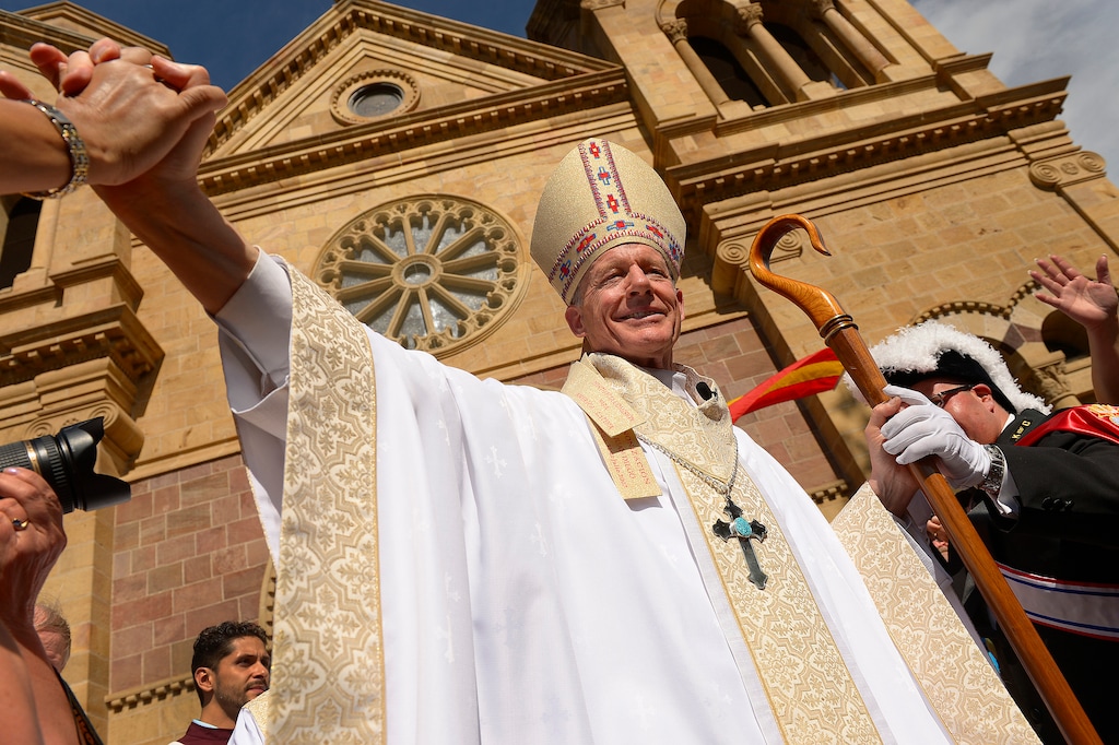 Leah Hogsten  |  The Salt Lake Tribune
The 12th Archbishop of Santa Fe John C. Wester is greeted by parishioners outside the cathedral after his Mass installation, Thursday, June 4, 2015 at the Cathedral Basilica of St. Francis of Assisi in New Mexico.