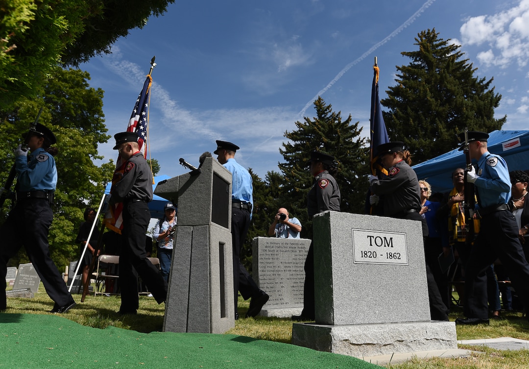 (Francisco Kjolseth  |  The Salt Lake Tribune)  In conjunction with the 400th anniversary of the arrival of African slaves in the United States, Salt Lake City dedicates the first grave marker for Tom, an enslaved Black pioneer who was buried in the Salt Lake City Cemetery in 1862 as the colors are presented at the start of the ceremony on Thursday, Aug. 22, 2019.