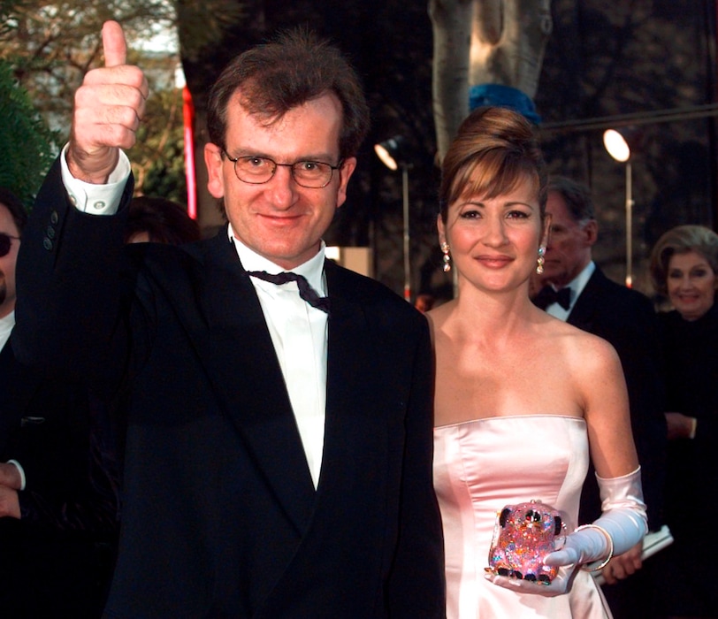 FILE - In this March 25, 1996 file photo, Director of "Babe" Chris Noonan, left, and the voice of "Babe" Christine Cavanaugh, right, arrive for the 68th Academy Awards at the Music Center in Los Angeles. Cavanaugh, 51, a prolific voice actress whose characters included the titular character of Babe, has died. Cavanaughs sister Deionn Masock confirmed Tuesday, Dec. 30, 2014, that Cavanaugh died December 22 at her home in Utah.   (AP Photo/Kevork Djansezian, File)