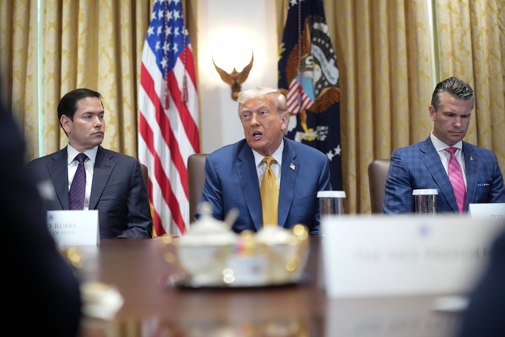 (Doug Mills | The New York Times) President Donald Trump speaks during a Cabinet meeting. From left: Secretary of State Marco Rubio, Trump, and Secretary of Defense Secretary Pete Hegseth.