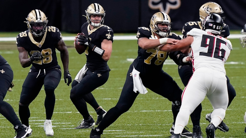 New Orleans Saints quarterback Taysom Hill (7) drops back to pass in the first half of an NFL football game against the Atlanta Falcons in New Orleans, Sunday, Nov. 22, 2020. (AP Photo/Butch Dill)