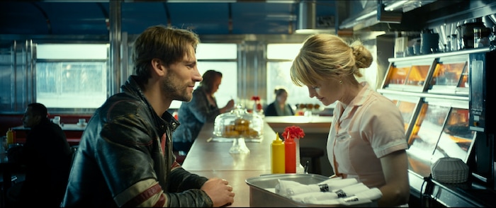 (photo courtesy Freestyle Releasing) Amber (Lindsay Pulsipher, right) resists the charms of Cody (Andrew W. Walker), a NASCAR driver, in the drama "God Bless the Broken Road."