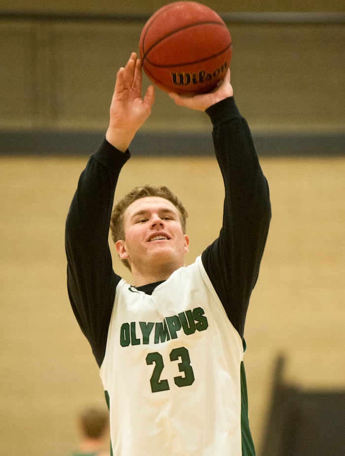 (Rick Egan  |  The Salt Lake Tribune)    Harrison Creer (23), one of Olympus boys' basketball team's two big men, runs drills during practice, Monday, January 8, 2018.
