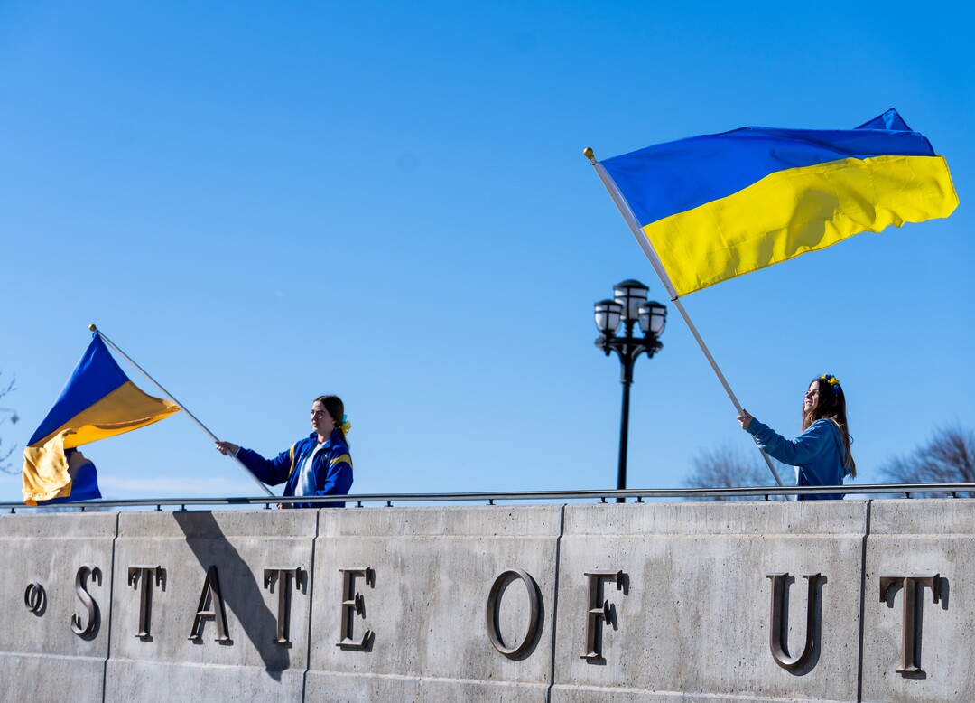 (Rick Egan | The Salt Lake Tribune) Masha Osipenko 18,  and Katya Osipenko, 17, from Orem,wave the Ukrainian flag, during a rally against Russia's invasion of Ukraine, organized by the Utah Ukrainian association, on Saturday, March 12, 2022.