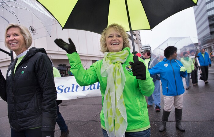 (Scott Sommerdorf | The Salt Lake Tribune) Salt Lake City Mayor Jackie Biskupski, right, marches with her wife, Betty Iverson, during the 40th annual Salt Lake City St. Patrick's Day Parade on Saturday, March 17, 2018.