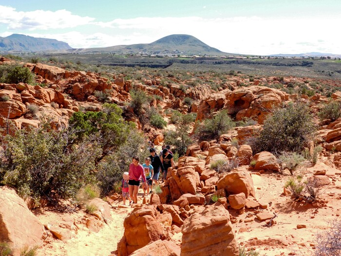 Erin Alberty  |  The Salt Lake TribuneHikers make their way through the Babylon Arch trail April 1, 2017 in the Red Cliffs Desert Reserve near Leeds.