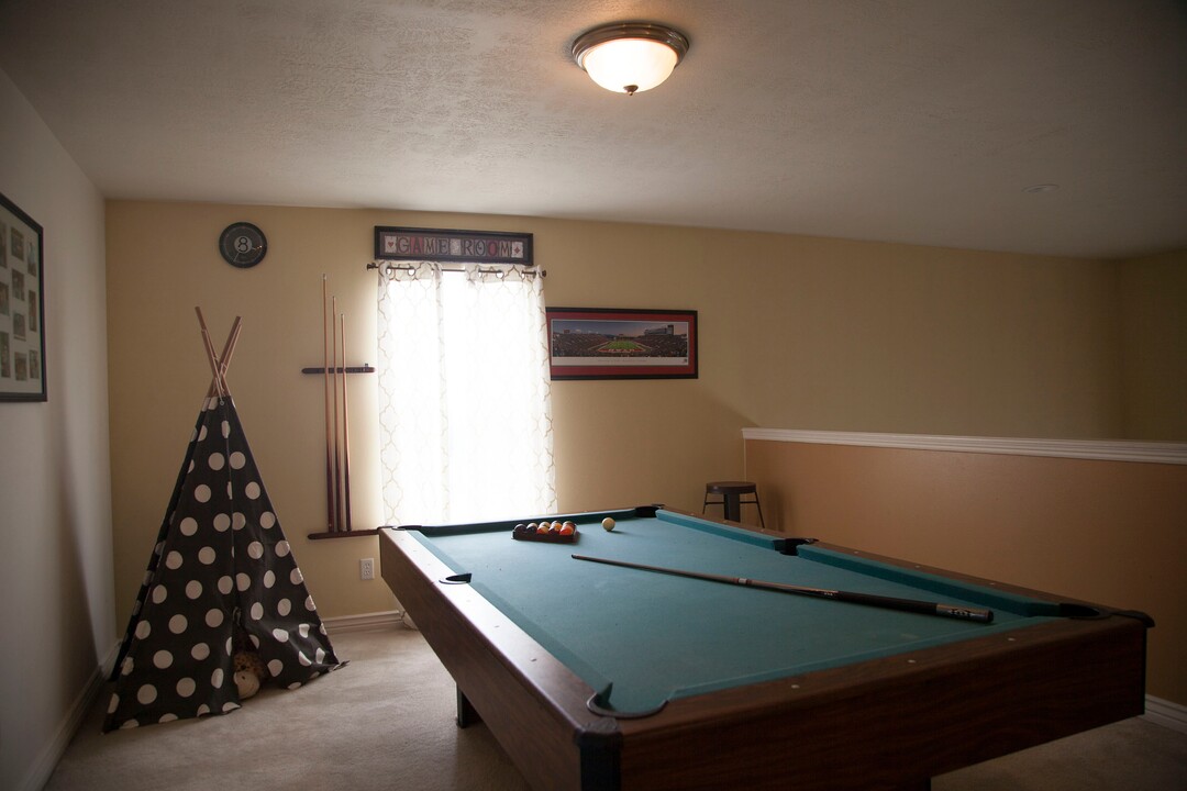 (Stella Yu |  The Salt Lake Tribune) Built in 2003, the 2,513-square-foot two-story home in Lehi comes with three upstairs bedrooms, two and a half baths, a kitchen, a family room and two dens with an open floor plan. The house also includes a two-car garage and space for RV parking.