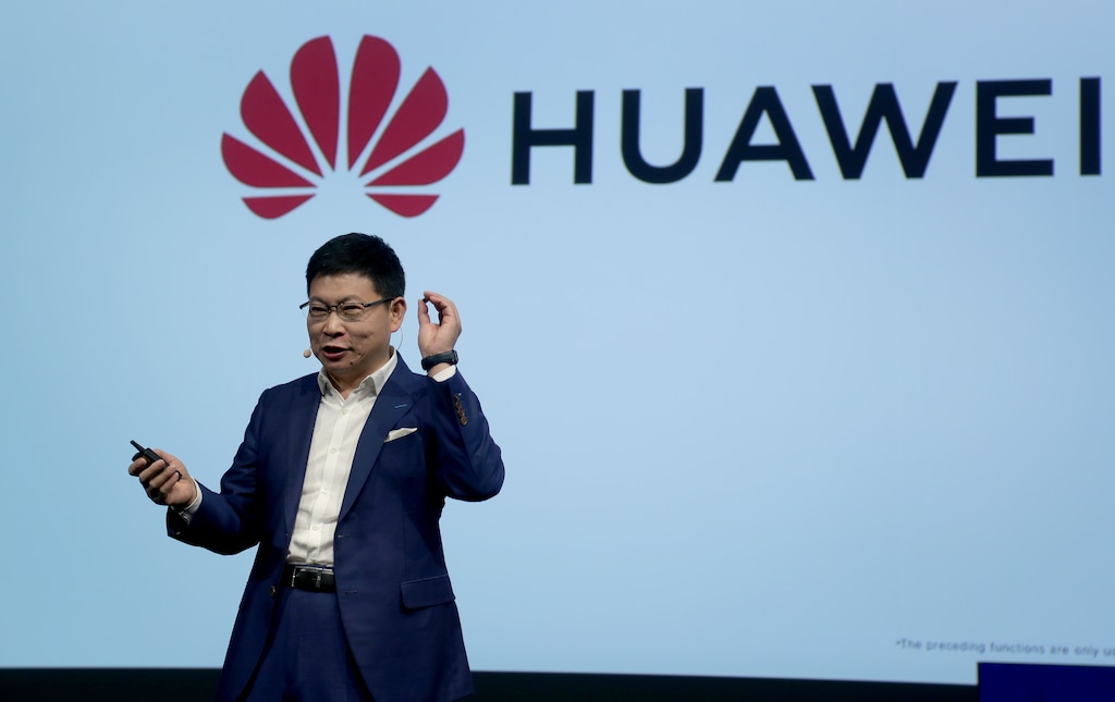 (Michael Sohn | AP file photo) Richard Yu, CEO of the Huawei consumer business group, holds a 'Kirin 990 5G' processor during a keynote at the IFA 2019 tech fair in Berlin, Germany, Friday, Sept. 6, 2019.