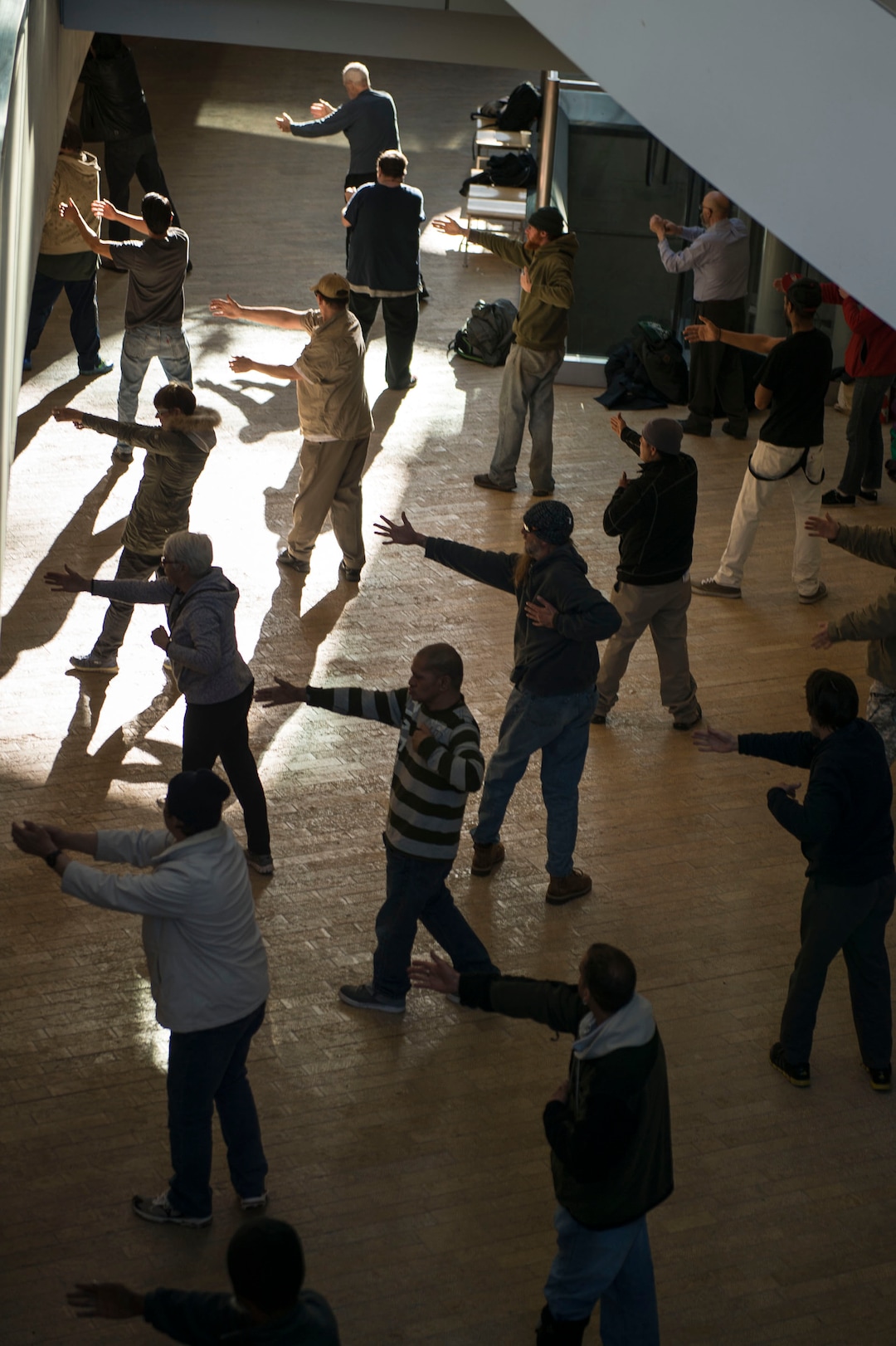 Lennie Mahler  |  The Salt Lake TribuneBernie Hart leads a group of homeless people in tai chi at the Salt Lake City Public Library, Thursday, March 2, 2017.