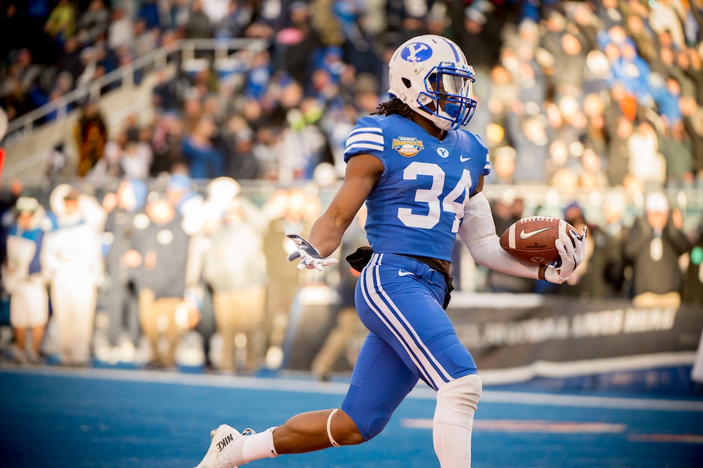 (Jeremy Harmon  |  The Salt Lake Tribune) Brigham Young Cougars running back Riley Burt (34) runs into the end zone for a touchdown as BYU faces the Western Michigan Broncos in the Famous Idaho Potato Bowl in Boise, Idaho, on Friday, Dec. 21, 2018.